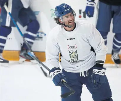  ?? STEVE RUSSELL TORONTO STAR ?? John Tavares took part in drills with kids at Mitch Marner’s fundraisin­g event at the Sports Village in Vaughan on Friday.