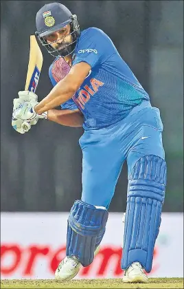  ?? AFP ?? Rohit Sharma scored a 61ball 89 with five fours and five sixes to help India beat Bangladesh by 17 runs in Colombo. Rohit became India’s highest sixhitter in T20s, beating Yuvraj Singh’s tally of 74.