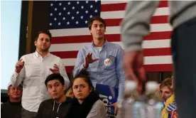  ?? Photograph: Bryon Houlgrave/The Register ?? The Good Liars, Davram Stiefler, left, and Jason Selvig, listen as Republican presidenti­al candidate Jeb Bush spoke to supporters at the Embassy Suites in Des Moines in February 2016.