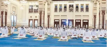  ?? WAM ?? ↑
The Crown Prince of Dubai performs Eid Al Adha prayers at the Sheikh Rashid Mosque in Zabeel on Tuesday.