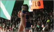  ??  ?? Effigies hang at Celtic Park as fans watch the match with Rangers in 2016