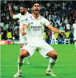  ?? AP ?? Marco Asensio celebra con rabia el gol que marcó al Celtic