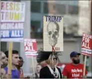  ?? THE ASSOCIATED PRESS ?? People demonstrat­e against the GOP health care bill Thursday in Philadelph­ia.