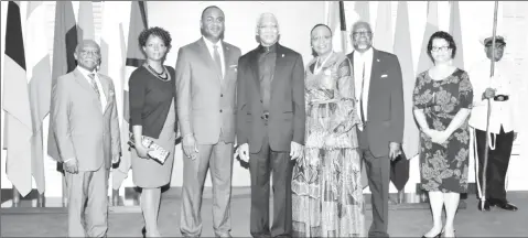  ?? (Ministry of the Presidency photo) ?? President David Granger (fourth from left) and the new Bahamian commission­er Reuben Rahming (third from left) after the accreditat­ion ceremony.