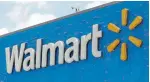  ?? ALAN DIAZ/THE ASSOCIATED PRESS FILE PHOTO ?? Walmart plans to roll out curbside grocery pickup to 2,200 stores by year-end.