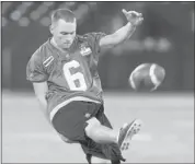  ?? Ryan Remiorz/the Canadian Press ?? Stampeders kicker Rob Maver practices before the Grey Cup in Toronto. He’ll be back for 2013 after negotiatin­g his own contract.