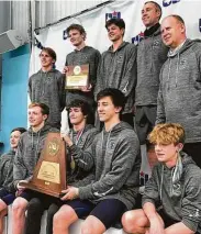  ?? Adam Coleman / Staff ?? Kingwood Park coach Greg McLain was thrilled his team reached the medal stand in all three relays.