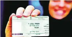 ?? Al Riyadh ?? Status rights A Saudi woman displaying personal card. It will help put an end to injustices suffered by women in the absence of the family book following the death of the husband or divorce.