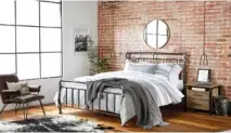  ?? WALMART VIA AP ?? This undated artist’s rendering provided by Walmart shows its industrial bedroom, which is part of Walmart’s new online home shopping experience that will let shoppers discover items based on their style.