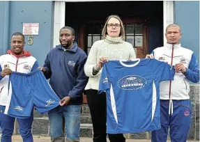  ?? Picture: ZINTLE BOBELO ?? THANK YOU: Local soccer team Seven Stars receive a kind and welcome donation of sports kit from local company Gaylard’s Agencies recently. Receiving the donation are, from left, coach Yongama Willie Kepkey with Gaylard’s sales manager Richman Sam, owner Judy Conroy, and Seven Stars chair Jan Draghoende­r