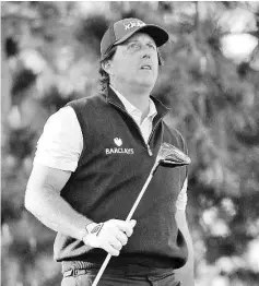  ??  ?? Phil Mickelson watches his tee shot on the 11th hole during the first round of the AT&amp;T Pebble Beach National Pro-Am at the Spyglass Hill Golf Course on February 11, 2016 in Pebble Beach, California. - AFP photo