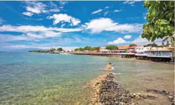  ??  ?? This undated photo provided by the Hawaii Tourism Authority shows a waterfront view of Front Street in Lahaina, Maui, Hawaii.