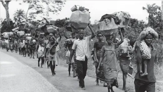  ??  ?? People being internally displaced during the Nigerian Civil War