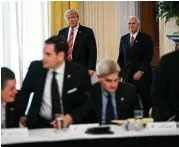  ?? Doug Mills / New York Times ?? President Donald Trump and Vice President Mike Pence arrive for a meeting with Senate Republican­s to discuss health care legislatio­n Tuesday.