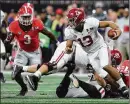  ?? CURTIS COMPTON / CCOMPTON@ AJC.COM ?? Alabama QB Tua Tagovailoa (13) is the front-runner to win the Heisman Trophy on his play for the Crimson Tide.