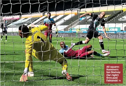  ?? PA ?? All square: Hammers fan Shelvey (far right) fires past Fabianski