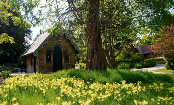  ??  ?? The Magnesia Well Pump Room, now surrounded by spring blooms.