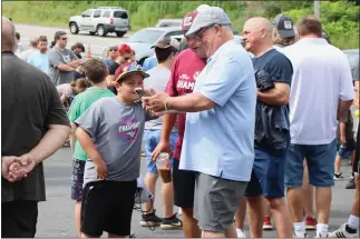  ?? CAMERON MORSBERGER — LOWELL SUN ?? An estimated 2,000 fans turned out to witness North Chelmsford native Jack Eichel bring the Stanley Cup to Skate 3 in Tyngsboro. One group arrived at 5:22 a.m. for the event, which started just after 10 a.m.