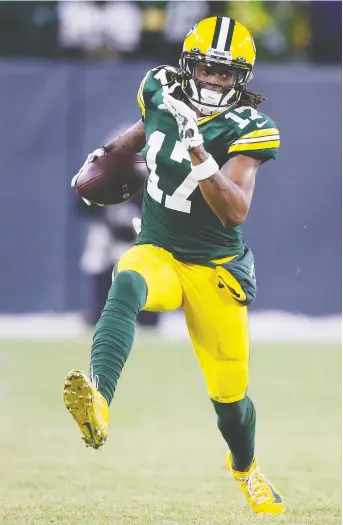  ?? GREGORY SHAMUS/GETTY IMAGES FILES ?? Davante Adams caught 115 passes this season for 1,374 yards and 18 TDS despite missing two games. Hall of Fame QB Kurt Warner says Adams is now one of the greats at his position.