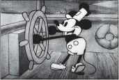  ?? VIA THE NEW YORK TIMES ?? A scene from the 1928animat­ed short “Steamboat Willie.” This version of the Mickey Mouse character entered the public domain on Monday.