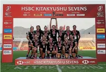  ?? PHOTOSPORT ?? The Black Ferns women’s sevens team celebrates winning the Japan Sevens tournament in Kitakyushu.