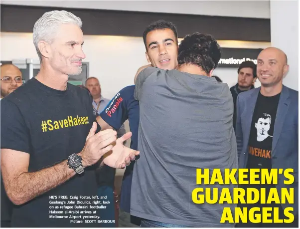  ?? Picture: SCOTT BARBOUR ?? HE’S FREE: Craig Foster, left, and Geelong’s John Didulica, right, look on as refugee Bahraini footballer Hakeem al-Araibi arrives at Melbourne Airport yesterday.