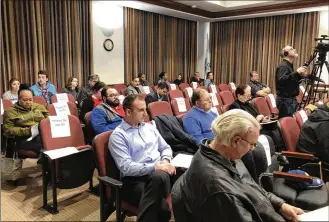  ??  ?? As a precaution, every other seat at Hamilton City Council’s Wednesday meeting was marked as a place people should not sit, as a precaution against the spread of coronaviru­s.