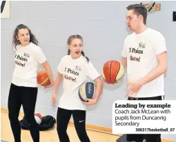  ??  ?? Leading by example Coach Jack McLean with pupils from Duncanrig Secondary