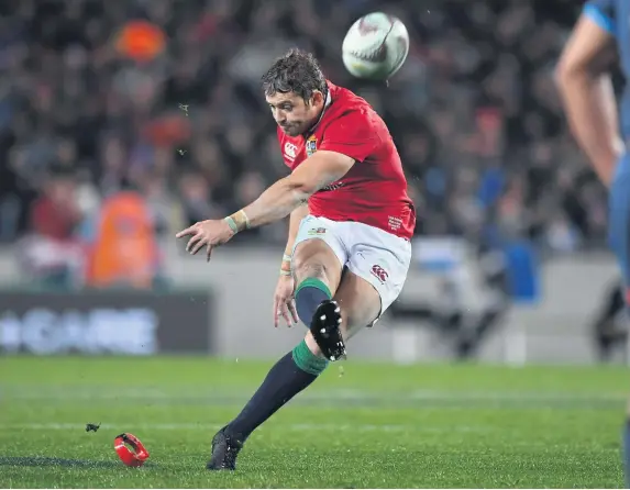  ??  ?? > Leigh Halfpenny, pictured on duty with the Lions in Auckland, is set to return home to Wales