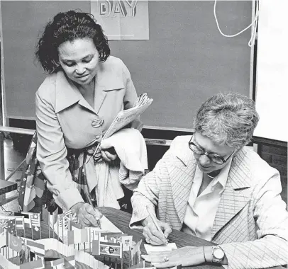  ?? THE COMMERCIAL APPEAL ?? Dr. Helen R. Nunn, left, professor in the department of home economics at Memphis State University, registers for a United Nations seminar with the help of Anne Shafer, president of the UN Associatio­n, on March 25, 1976. The seminar, “The United Nations Today and Tomorrow,” was held at Richardson Towers at Memphis State.