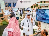  ??  ?? Visitors experiment with new concepts at the pavilions of Abu Dhabi, Sharjah and Umm Al Quwain during the 38th Gitex Technology Week in Dubai on Sunday. The event runs for five days.