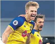  ??  ?? Former Celtic midfielder Stuart Armstrong celebrates scoring the second of his two goals for Southampto­n yesterday