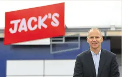  ??  ?? David Lewis, chief executive of Tesco, standing outside one of the new Jack’s stores