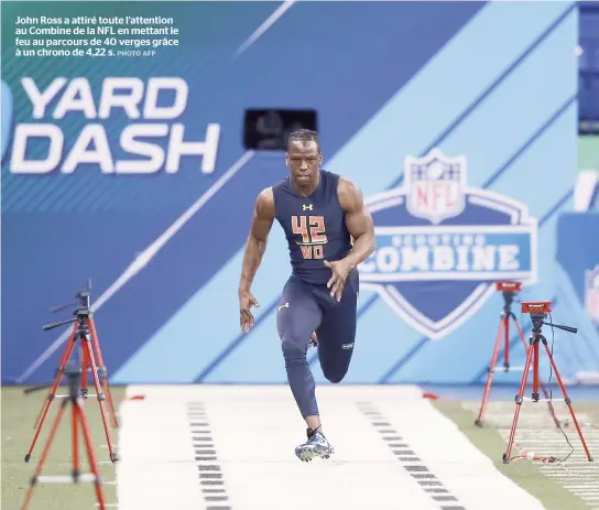  ??  ?? John Ross a attiré toute l’attention au Combine de la NFL en mettant le feu au parcours de 40 verges grâce à un chrono de 4,22 s.