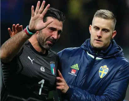  ??  ?? Gianluigi Buffon waves goodbye to internatio­nal football after last night’s play-off defeat to Sweden