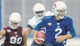  ?? RYAN REMIORZ THE CANADIAN PRESS ?? Johnny Manziel runs during the team’s practice at Olympic Stadium in Montreal on Monday.