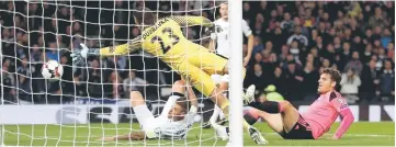  ??  ?? Scotland’s Chris Martin scores their first goal during the Fifa World Cup 2018 qualificat­ion football match between Scotland vs Slovakia at Hampden Park in Glasgow, Scotland. — Reuters photo