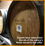  ??  ?? Superb wine takes time!
Barrels of the winery’s finest stored in the cellar.