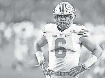  ?? MARK J. REBILAS, USA TODAY SPORTS ?? Sam Hubbard, who had 6 1⁄2 sacks as a freshman in 2015, anchors Ohio State’s defensive line.