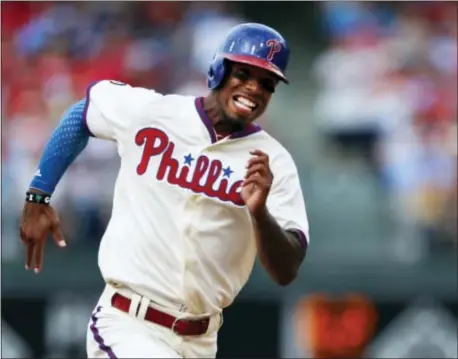  ?? LAURENCE KESTERSON — THE ASSOCIATED PRESS ?? Nick Williams’ memorabili­a collection grew Sunday when the rookie of six blasts by the Phillies — in Sunday’s 7-1 romp past San Diego. outfielder hit his first major league home run — one