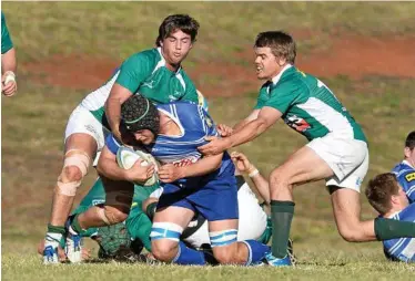  ?? PHOTO: KEVIN FARMER ?? GROUNDED: Brendon Ralph of USQ is taken down by the Condamine defence in round nine of the Risdon Cup at USQ.