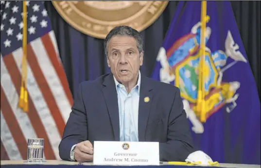  ?? John Roca The Associated Press ?? New York Gov. Andrew Cuomo briefs the media Saturday on his state’s latest coronaviru­s-related deaths.