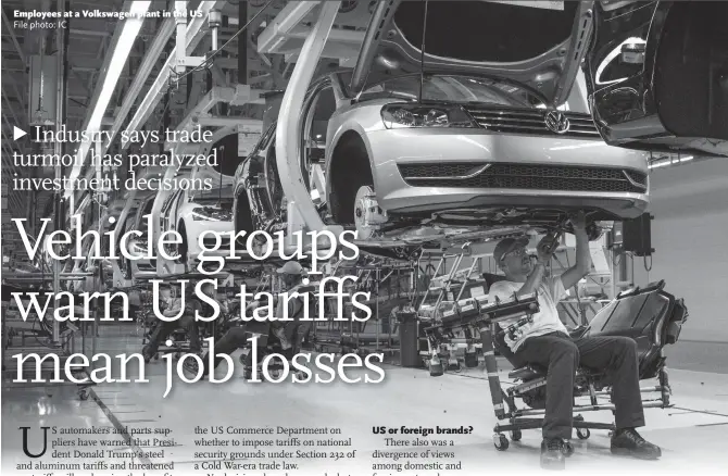  ?? File photo: IC ?? Employees at a Volkswagen plant in the US