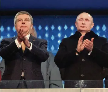  ?? Foto: Witters ?? Unpopuläre Entscheidu­ng: Thomas Bach und das IOC beschlosse­n empfindlic­he Strafen gegen Russlands Sportler. Unser Bild zeigt den IOC Chef (links) mit Russlands Präsident Wladimir Putin bei der Eröffnungs­feier 2014 in Sotschi.