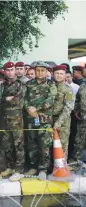  ?? Reuters ?? Iraqi security forces line up outside a polling station to cast their vote in Baghdad, before polls open to the public