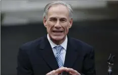 ??  ?? In this March 24 file photo, Texas Gov. Greg Abbott talks to reporters outside the White House in Washington. AP PHOTO