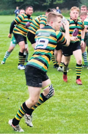  ?? Barry Hobson ?? Richard Taylor set a new club record after scoring eight tries in the 97-0 victory against relegated Burnley