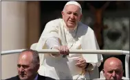  ?? (AP/Andrew Medichini) ?? Pope Francis leaves at the end of his weekly general audience Wednesday in St. Peter’s Square at the Vatican.