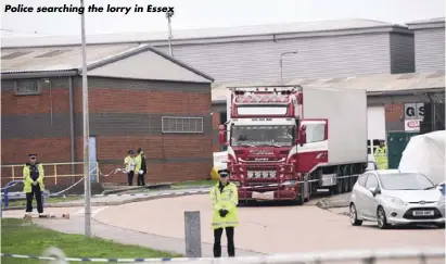  ??  ?? Police searching the lorry in Essex