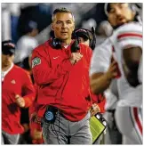  ??  ?? “With all due respect, we went on the road twice, against TCU, a top 10 team on the road andPenn State on the road,” OSU coach Urban Meyer said. “I don’t know any school in the country that did that this year. We walked away with wins.”